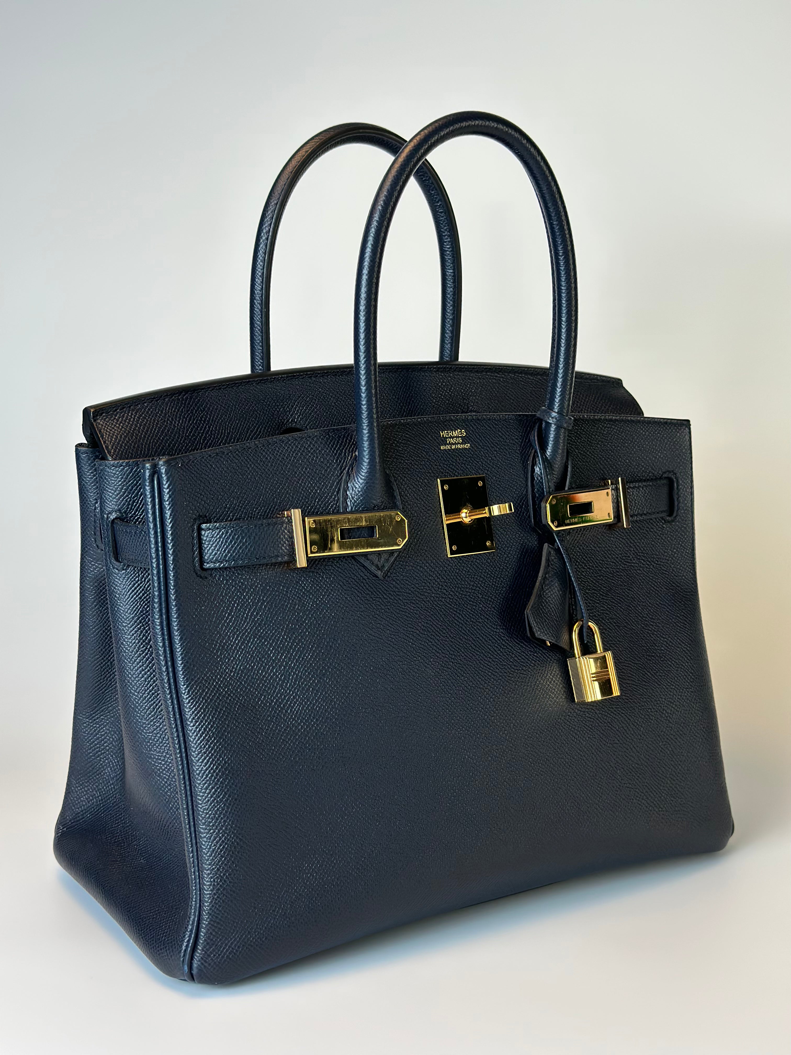 HERMES BIRKIN 28 RETOURNE EPSON BLUE SAPPHIRE HANDBAG GOLDEN HARDWARE front 45 degrees