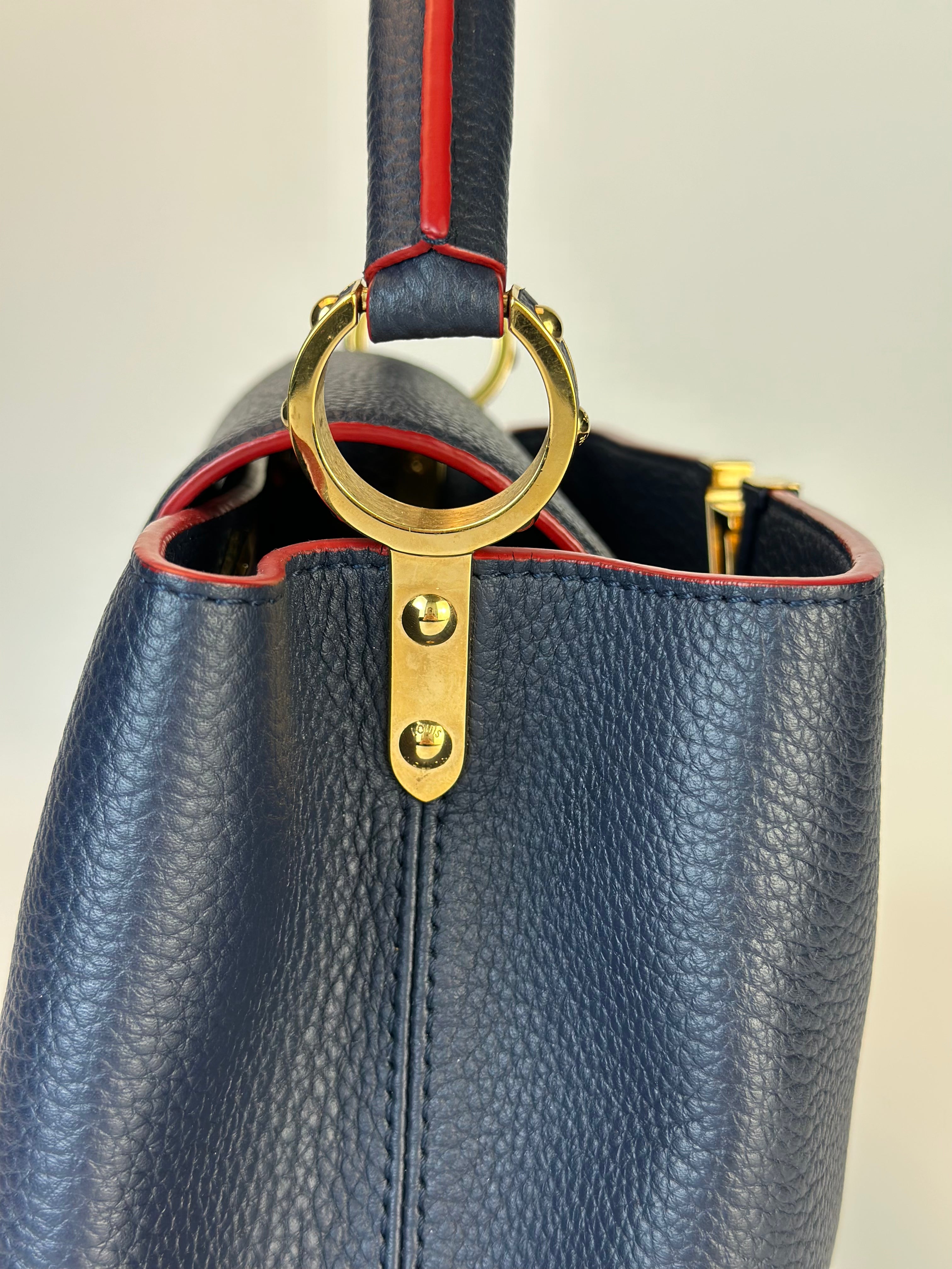 LOUIS VUITTON CAPUCCINES MM BAG in Navy Blue and Red Finishing