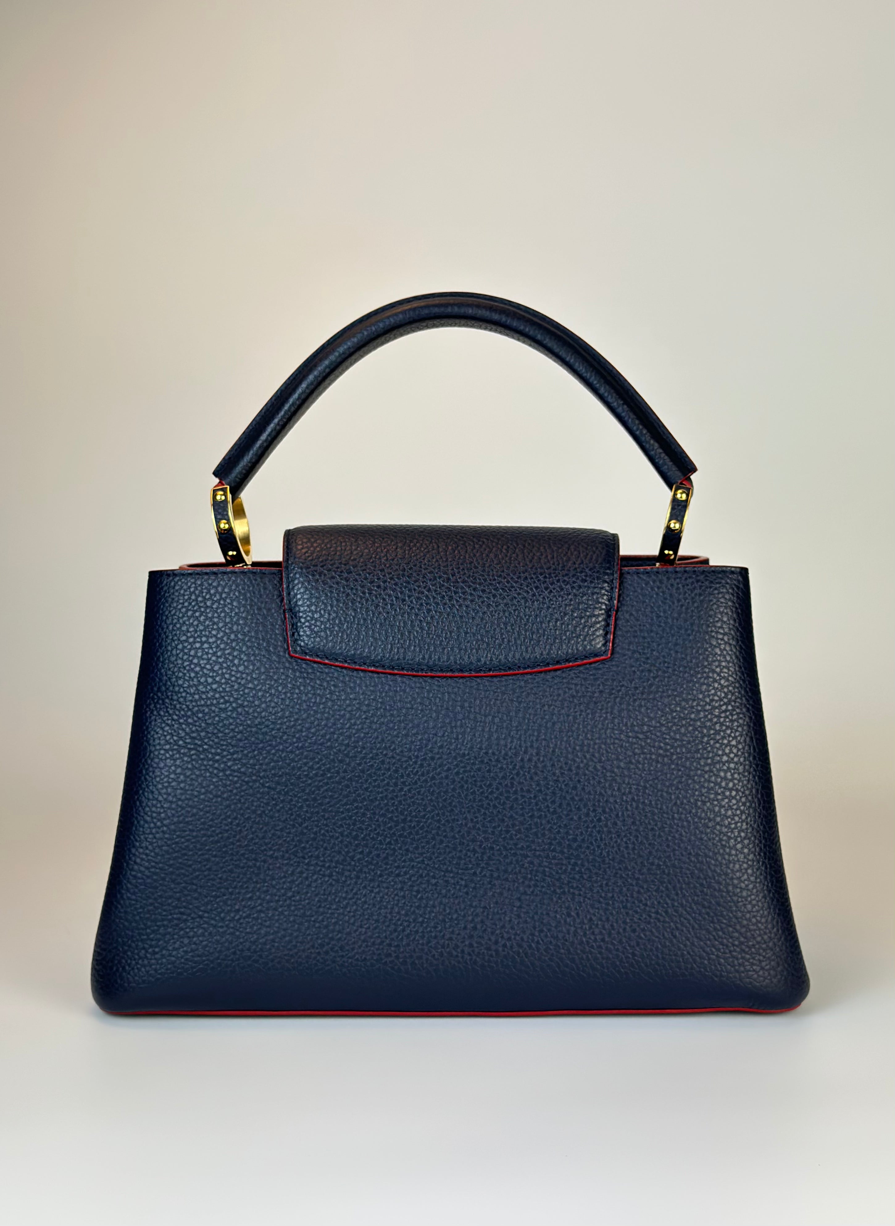 LOUIS VUITTON CAPUCCINES MM BAG in Navy Blue and Red Finishing