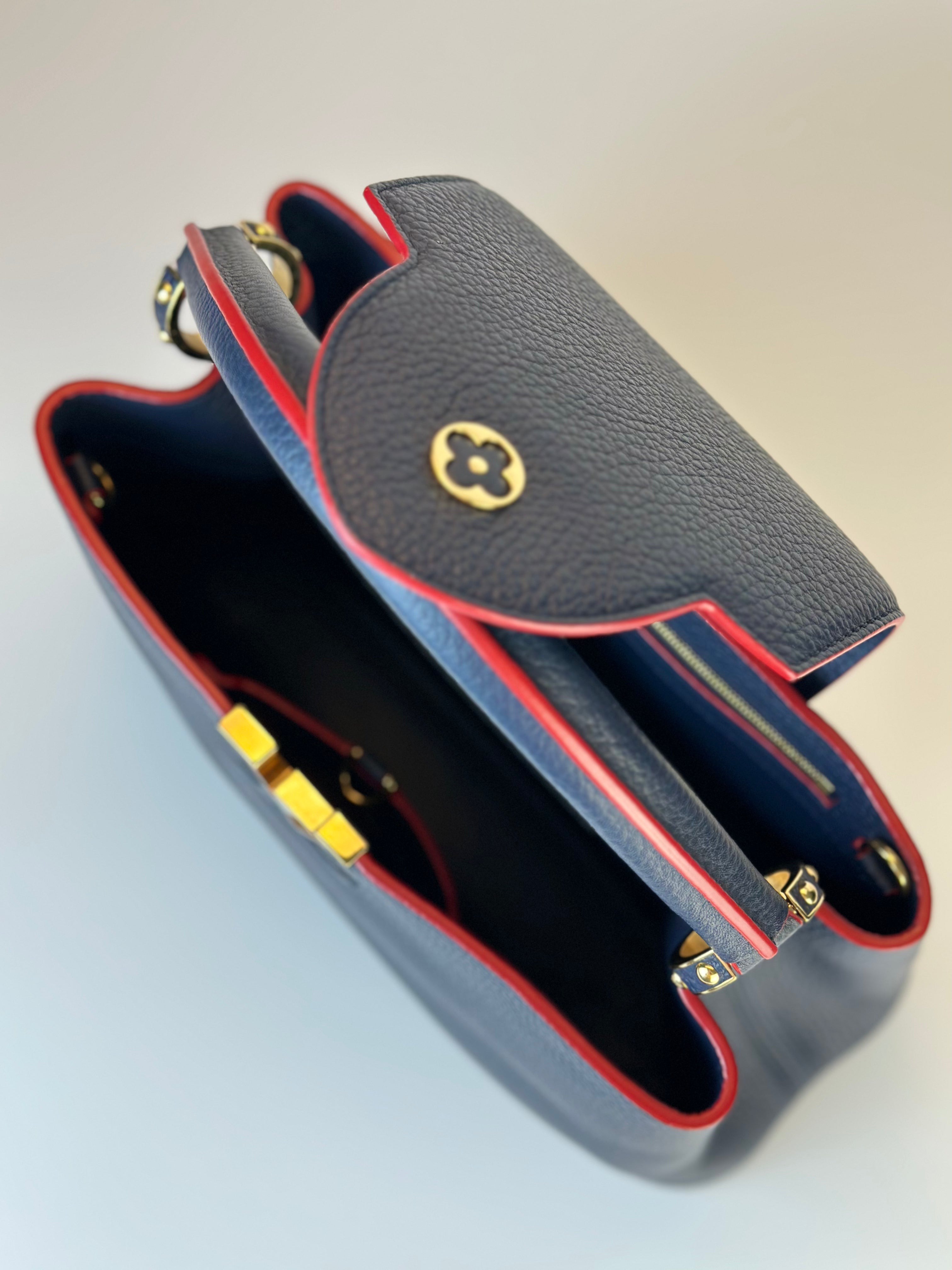 LOUIS VUITTON CAPUCCINES MM BAG in Navy Blue and Red Finishing