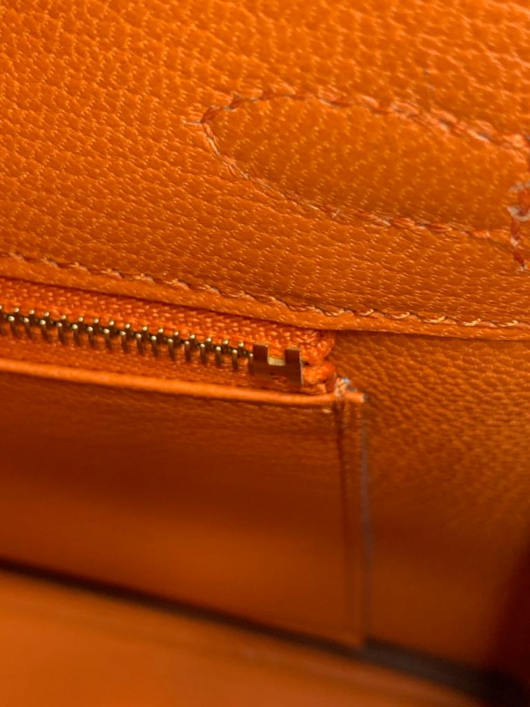 Hermes Birkin 25 Togo Orange handbag Gold hardware hermes logo in zipper