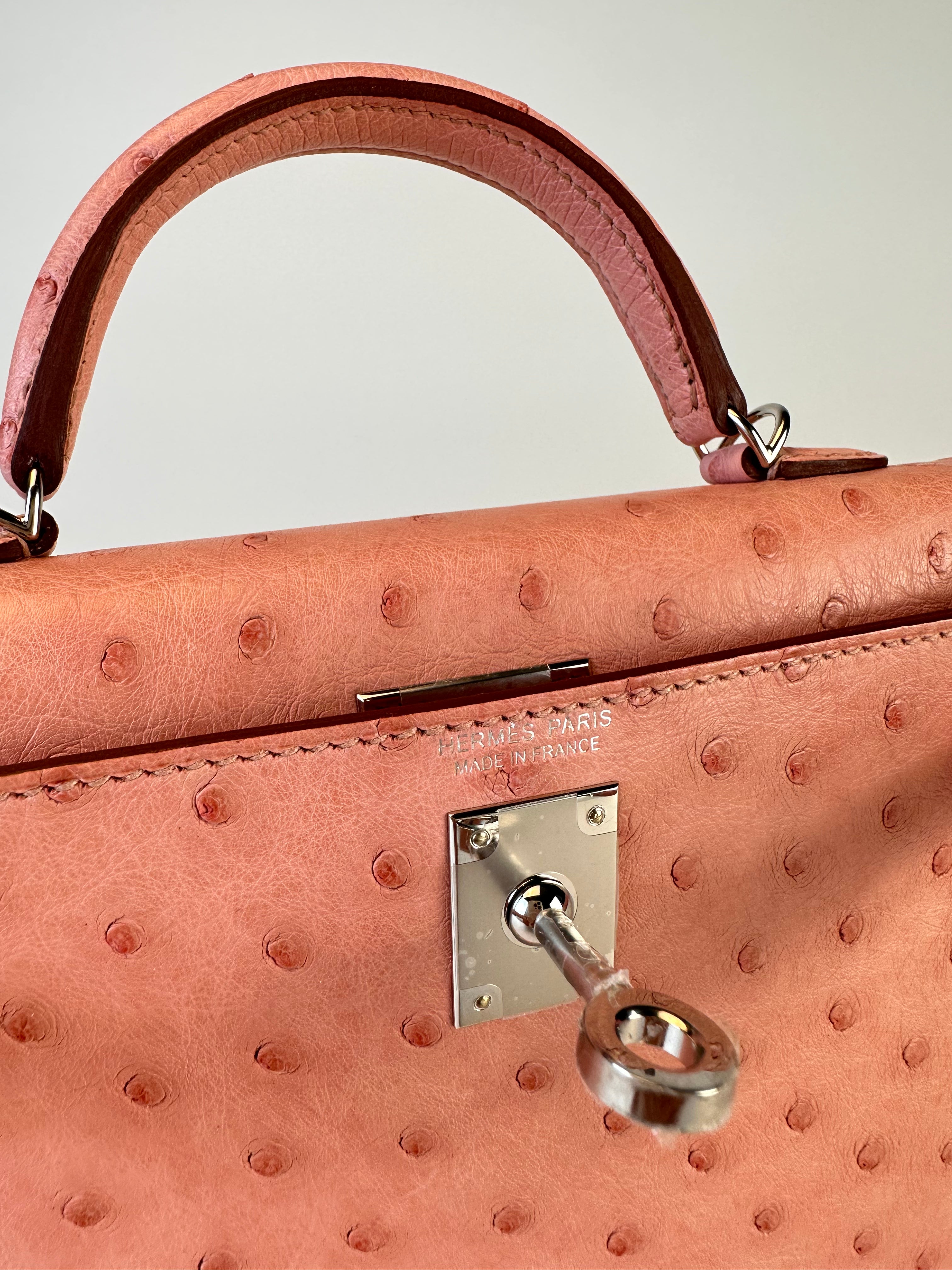 HERMES KELLY 20 OSTRICH SELLIER HANDBAG IN TERRE CUITE WITH PALLADIUM HARDWARE front close up