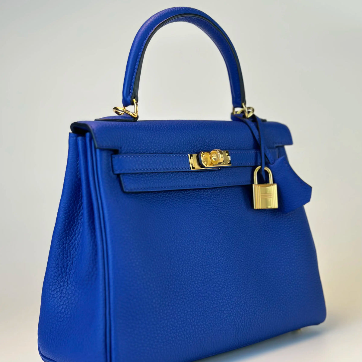 HERMES KELLY 25 Togo Blue Royale Handbag with Gold Hardware
