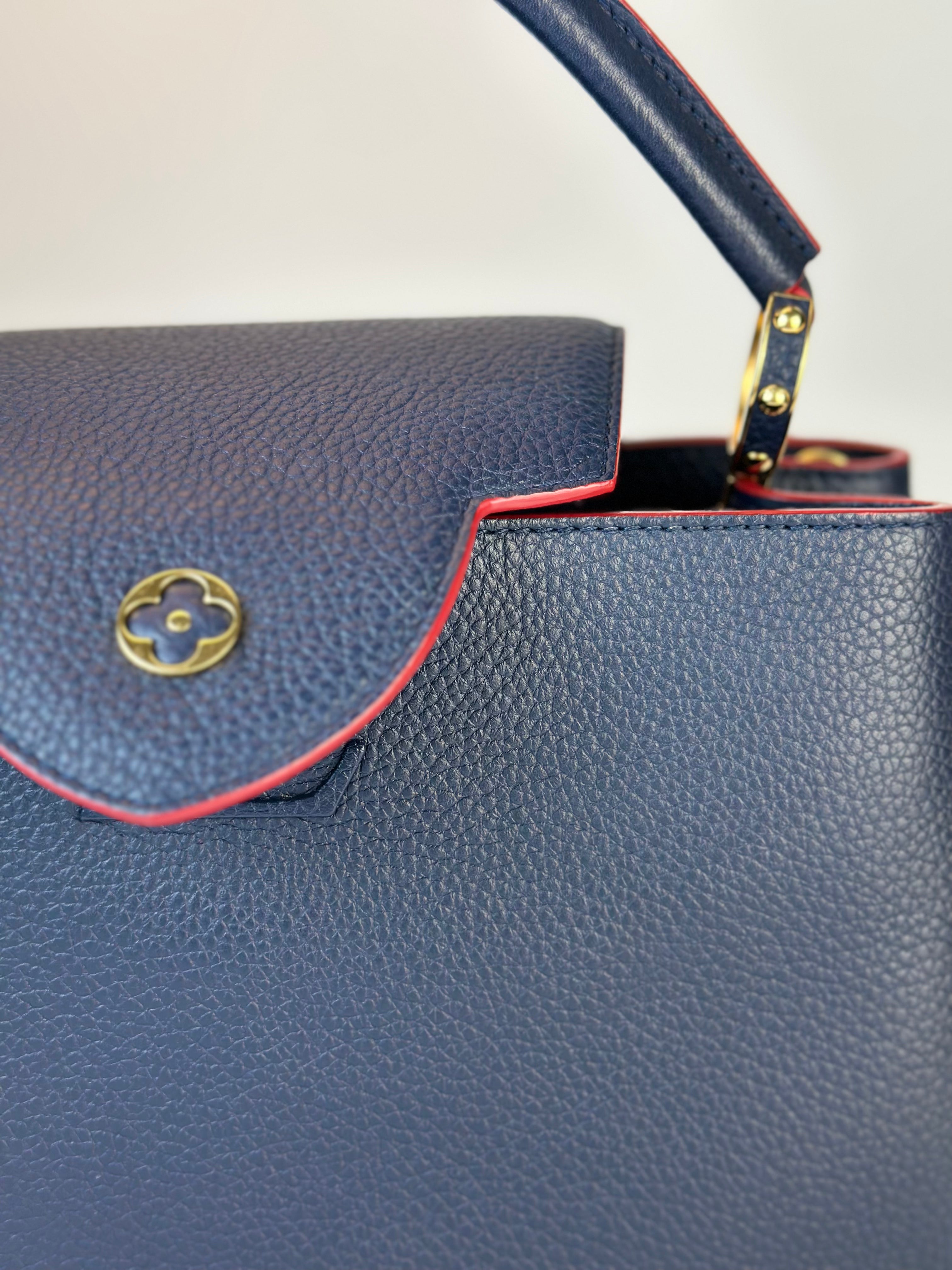 LOUIS VUITTON CAPUCCINES MM BAG in Navy Blue and Red Finishing